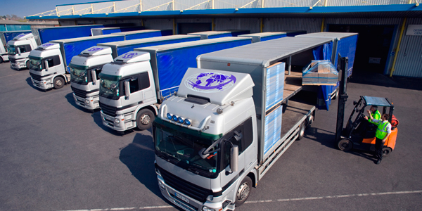 Trucks being loaded with contents