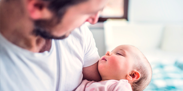 Father with baby in arms