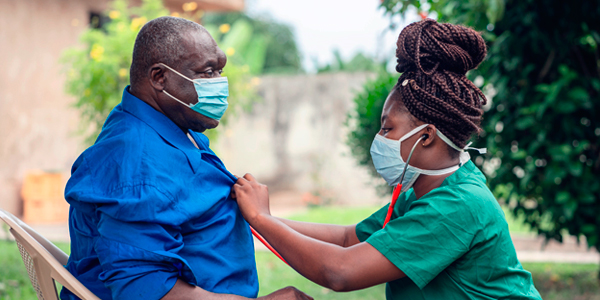 Nurse examining patient