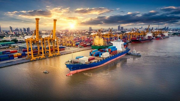 Cargo ship transporting goods through canal