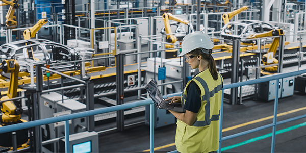 Worker using technology to retrieve item in a warehouse