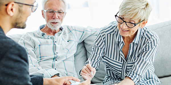 Grandparents meeting with an advisor to discuss wealth management for next generation